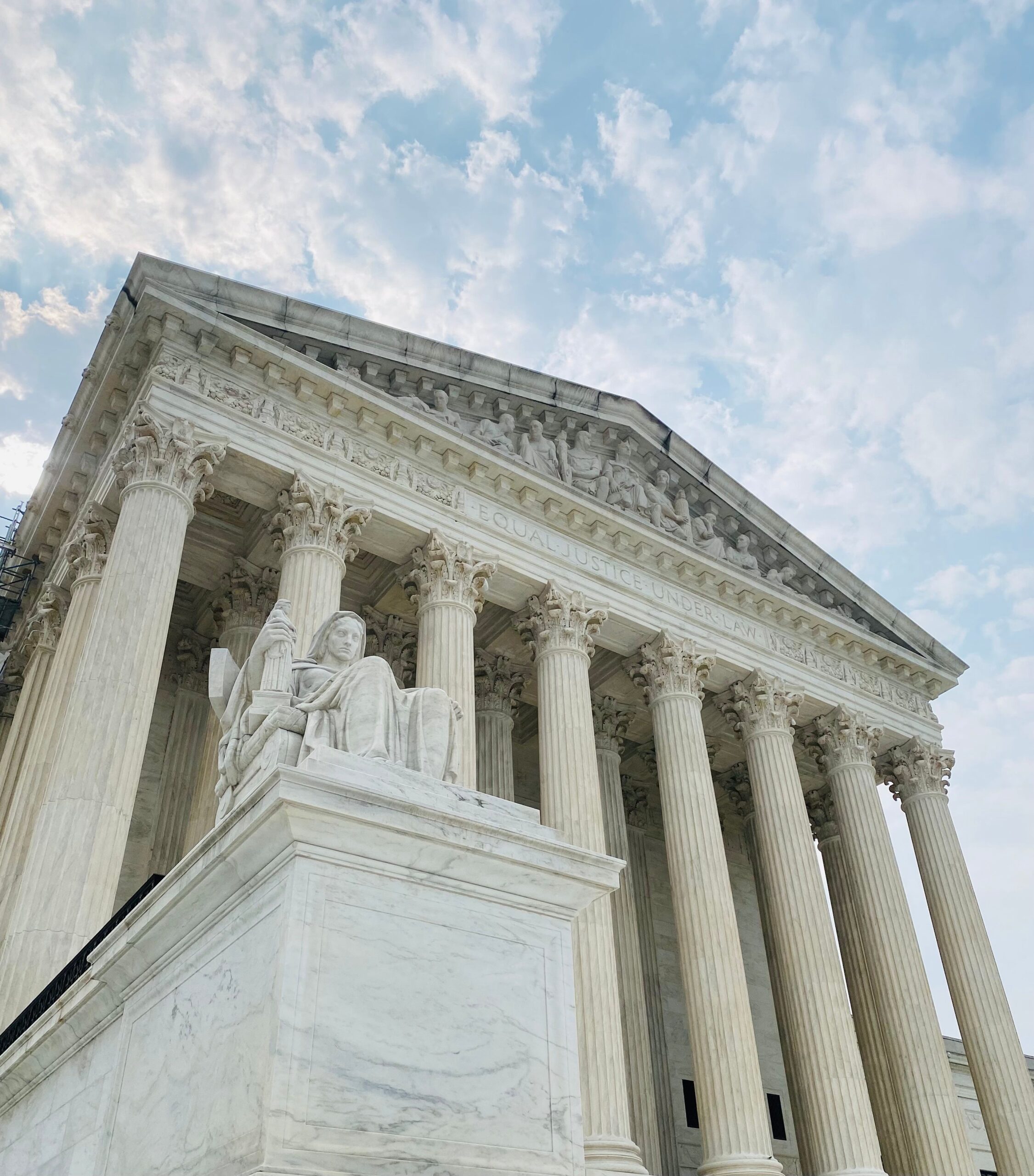 pexels-photo-17843099-17843099 A low angle shot of the US Supreme Court showcasing its grandeur and architectural detail.